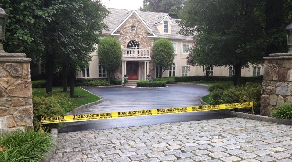 Residential driveway sealcoating and paving project