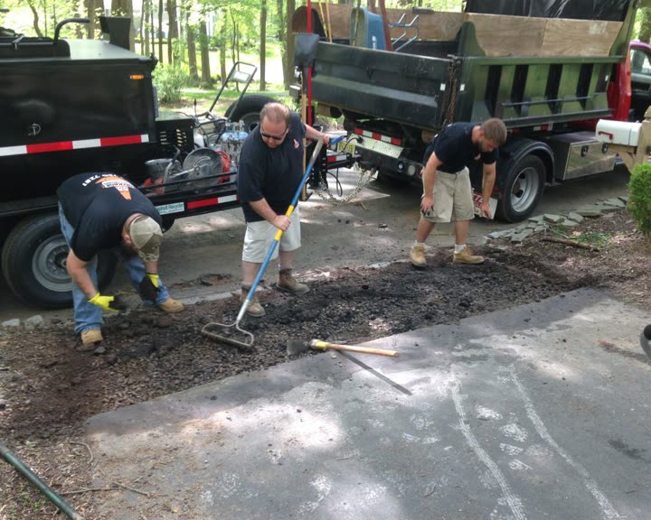 Residential Cut & Patch Driveway Repair - photo 4