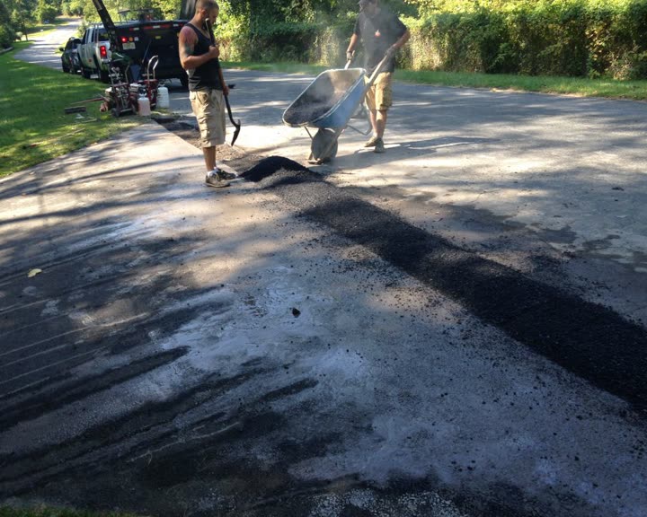 Residential Cut & Patch Driveway Repair - photo 7