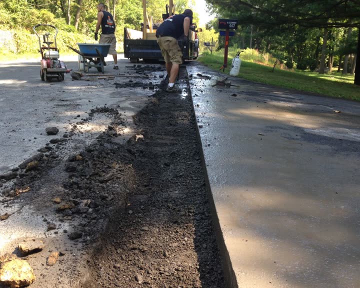 Residential Cut & Patch Driveway Repair - photo 8