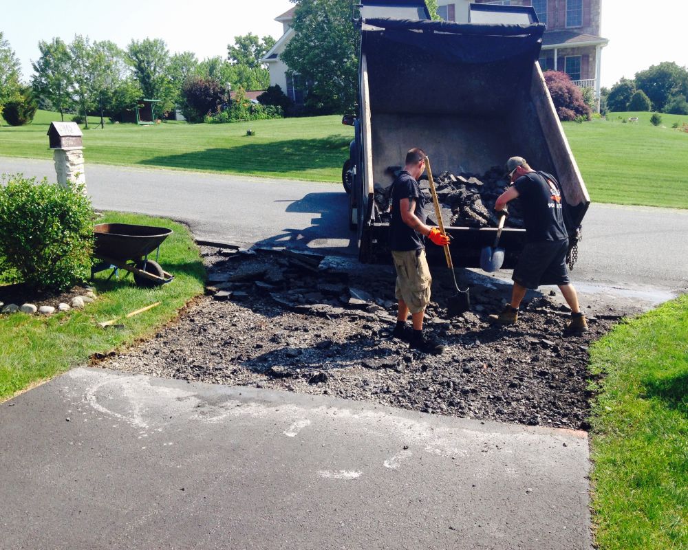 Residential Cut & Patch Driveway Repair - photo 17