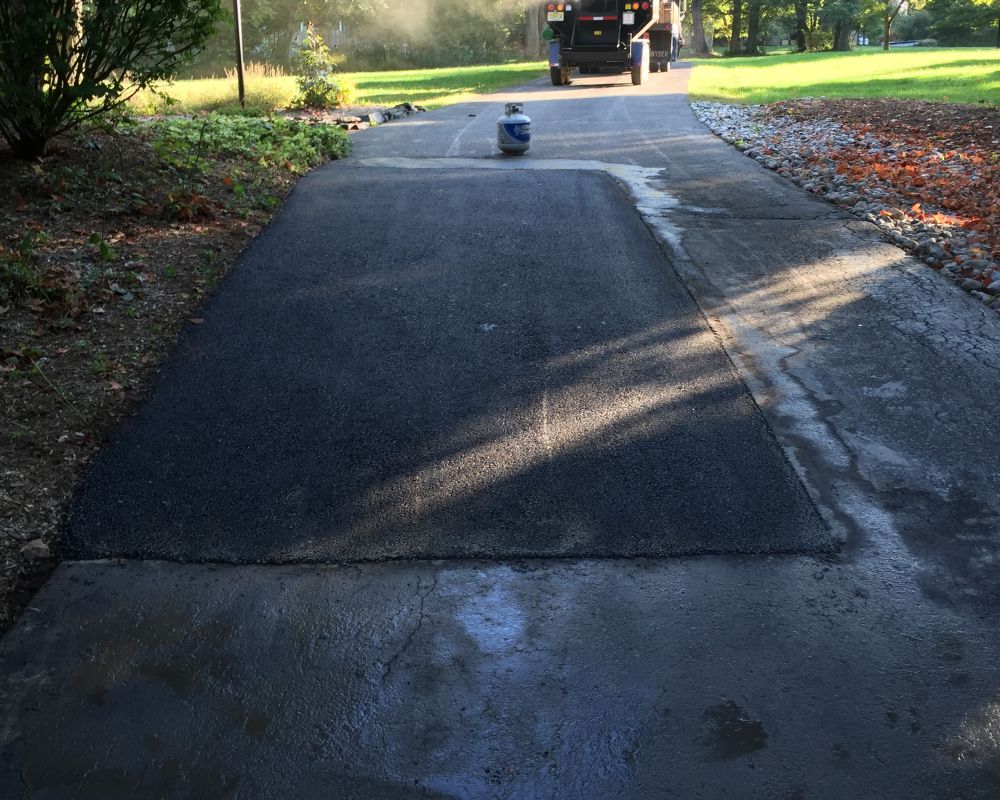 Residential Cut & Patch Driveway Repair - photo 18