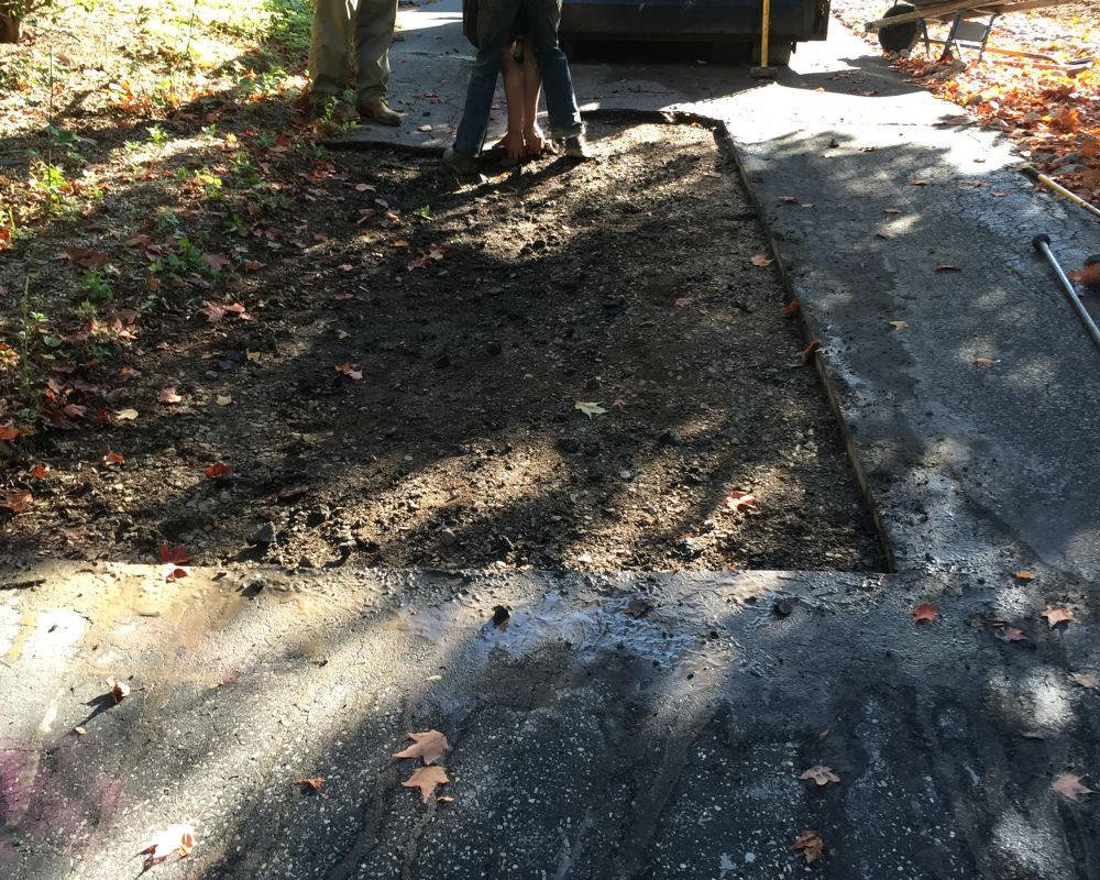 Residential Cut & Patch Driveway Repair - photo 19