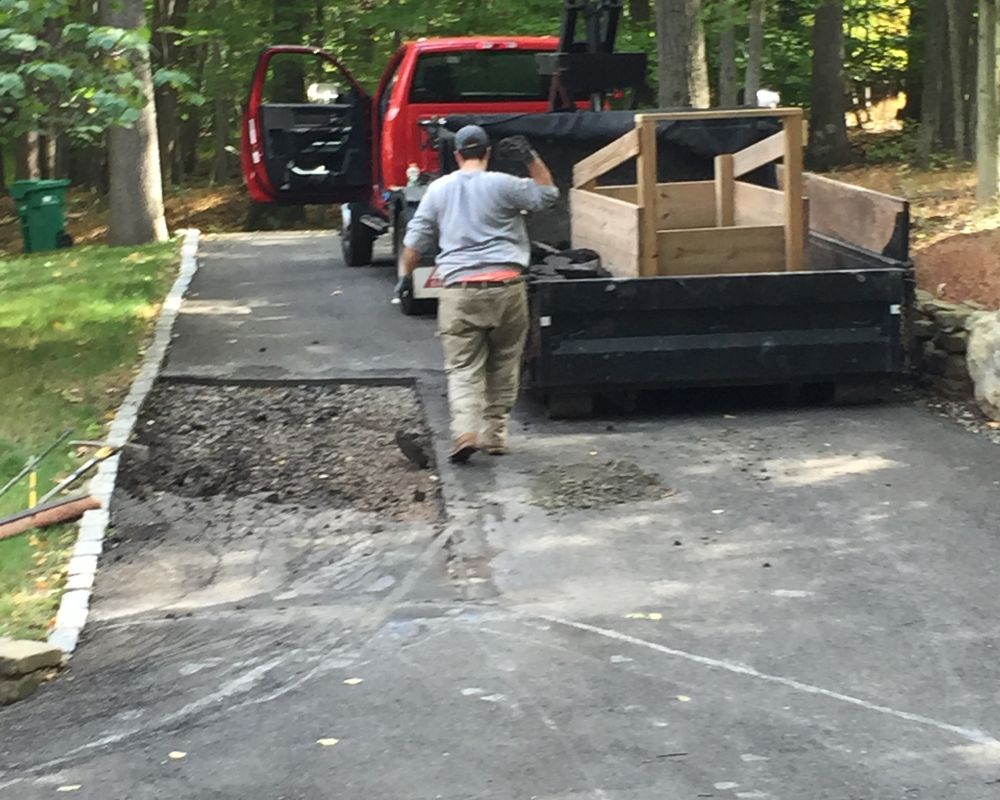 Residential Cut & Patch Driveway Repair - photo 23