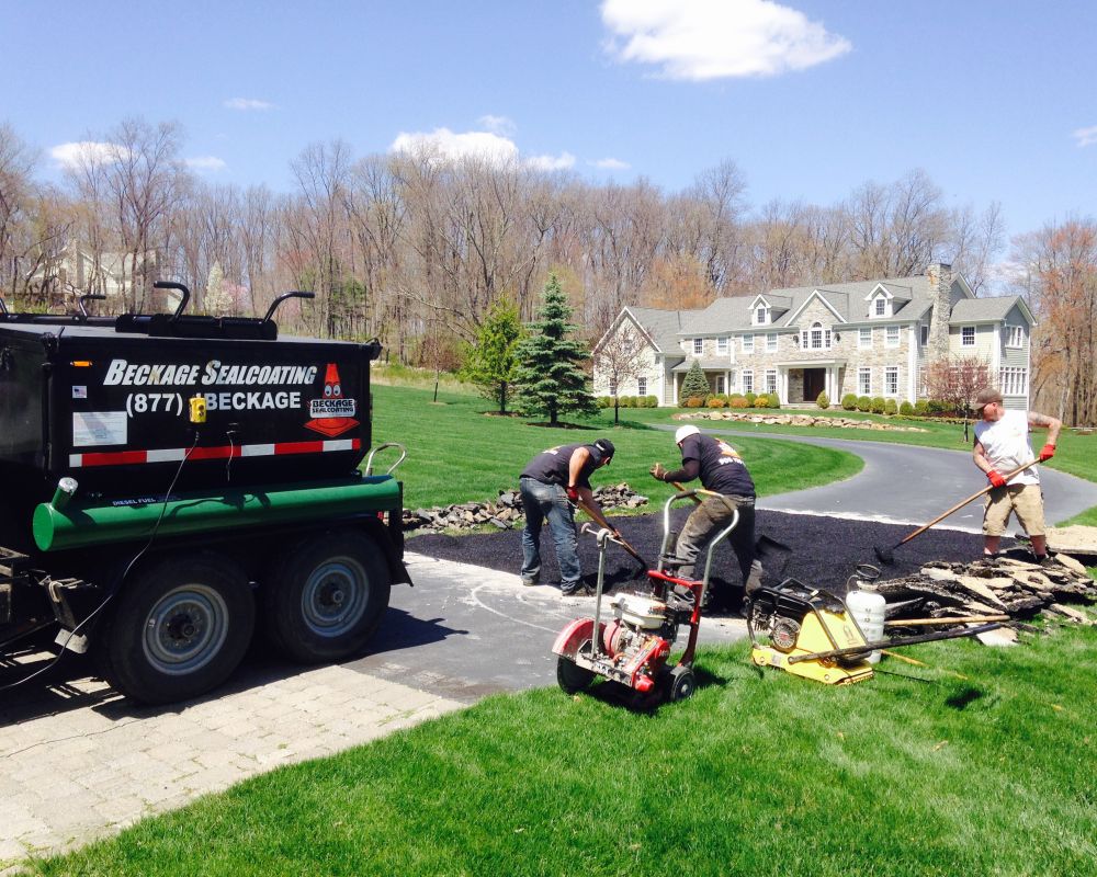 Residential Cut & Patch Driveway Repair - photo 32