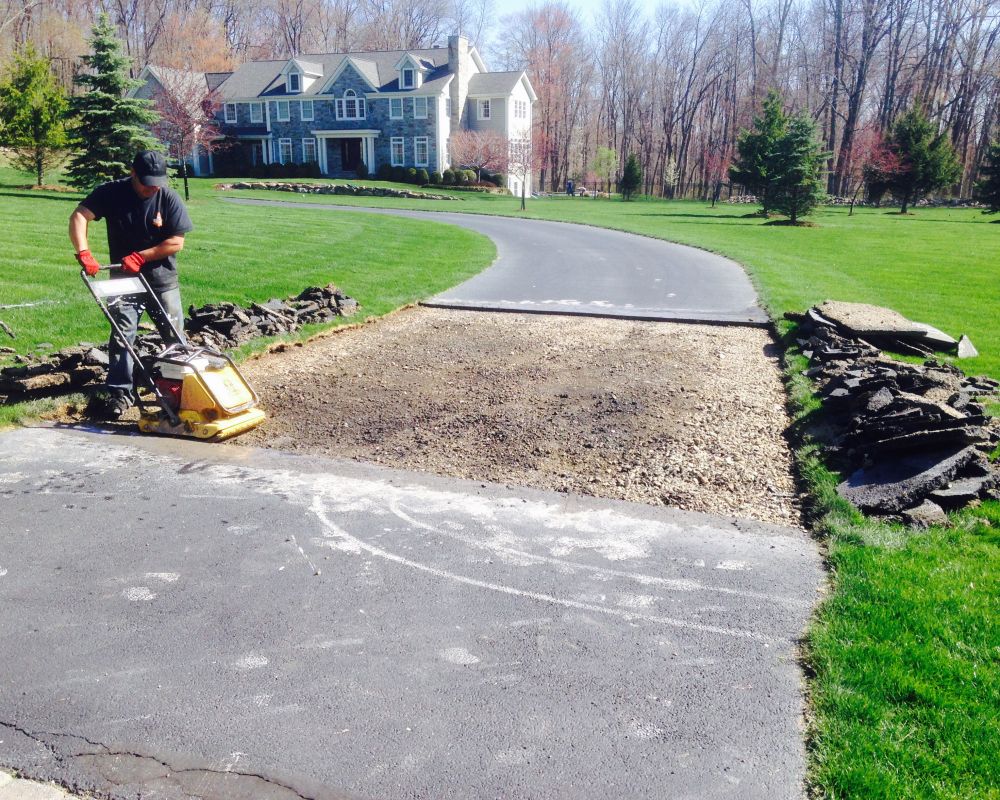 Residential Cut & Patch Driveway Repair - photo 35
