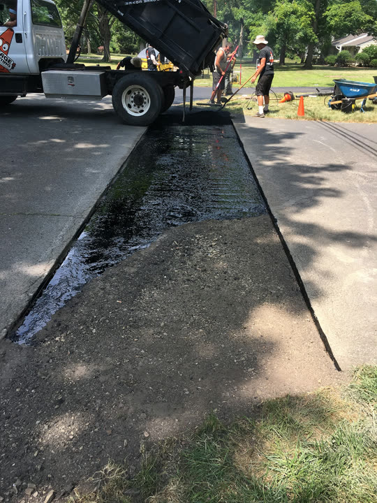 Residential Cut & Patch Driveway Repair - photo 43