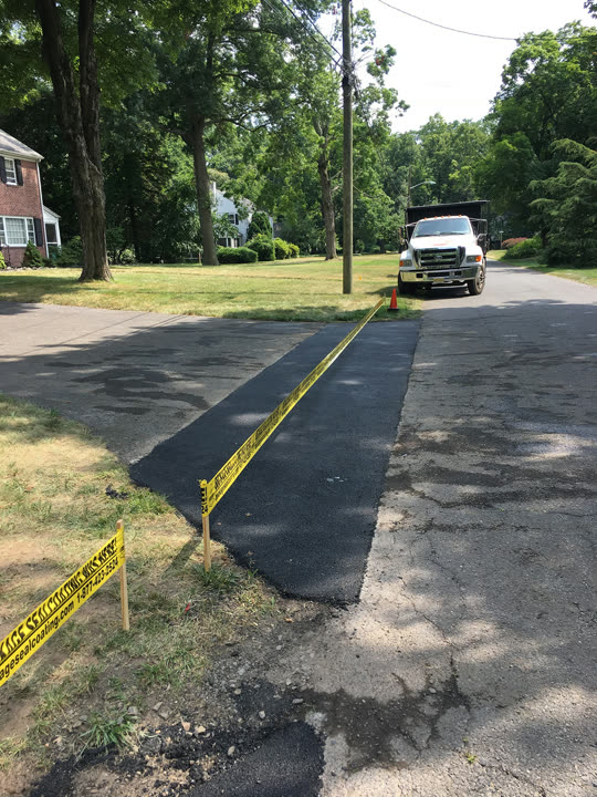 Residential Cut & Patch Driveway Repair - photo 45