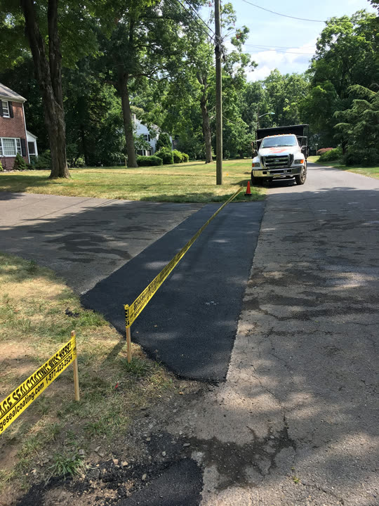 Residential Cut & Patch Driveway Repair - photo 46
